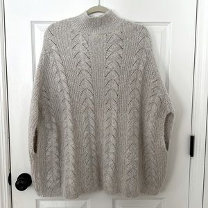 Cream Knit Poncho from Anthropologie